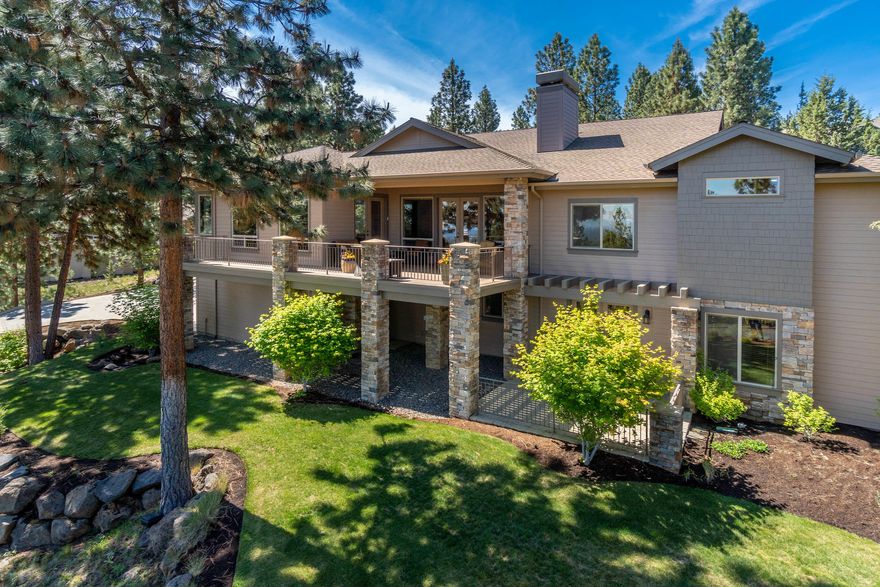 Welcome to the entertainers dream, Rundle-Built Home in the desirable Northwest side of Awbrey Butte. A builder's custom home, boasts essential main level living, including a spacious master w/ fireplace, 2 guest suites, & extremely spacious media/game room. Also enjoy enlarged wood-wrapped windows framing beautiful vistas of the mtns., romantic fireplace (w/ floor to ceiling rock surround), w/ immense natural light (4 skylights) & is extremely well insulated. Chef's kitchen w/ upgraded appliances leads you to the delightful & expansive patio w/ trex decking & also hot tub staged outside of the elegant master suite on main floor. Custom wood floors & plush carpet. Don't forget the 2 upgrade garages that offers heated storage for 5 cars. Air conditioning, brand new furnace, heated driveway. Truly something for everyone, including direct access to River Trail North. Don't miss this epic opportunity!