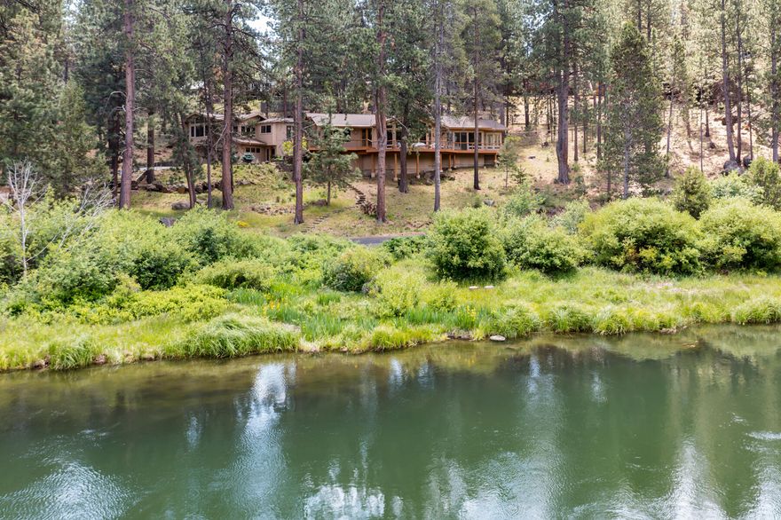 Riverfront property in Bend doesn't come up for sale very often. The Deschutes River is just a few steps away. With over 3 acres of highly sought after riverfront property in the private gated community of River Bluff Estates you can enjoy the river on your own terms. Views of the river are maximized from every room in the home. Cozy up next to the fireplace in the open great room or in the primary bedroom without losing the view of the river. A great home for entertaining with copper detailed countertops and an exclusive commissioned wood carved support post. Cooking is a dream with the large u-shaped kitchen island. Over $250,000 in recent renovations include, all new hardwood flooring, kitchen counter tops, a tiled shower, soaker tub, appliances, bonus room renovation and fencing.