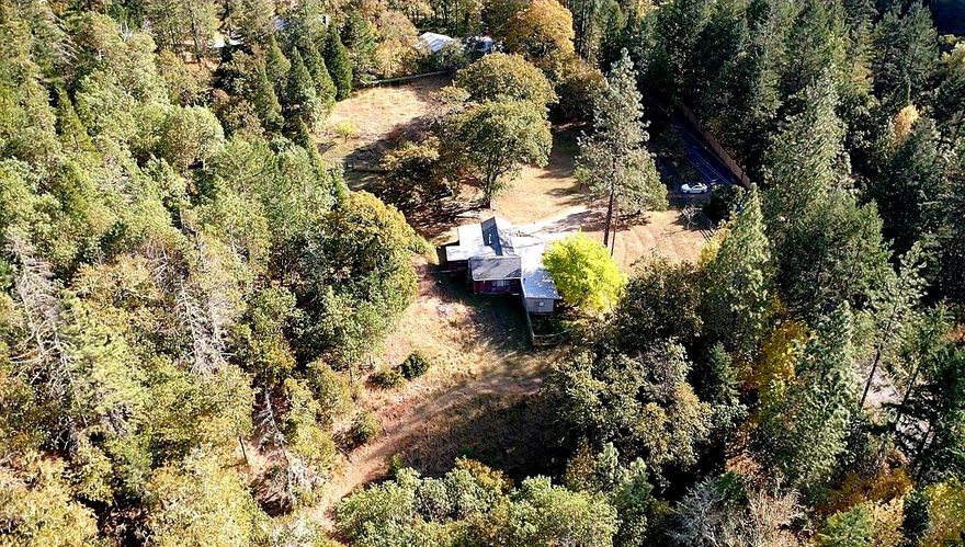 Hurry this wont last long! Usable, partially wooded acreage, with amazing views, quiet, plenty of privacy and close to town. Build your dream home or you can renovate the existing one. Possibilities are endless. There is plenty of room to expand, plenty of room for a shop and RV Parking.One of a kind piece of property. Property is to be sold as is. Value is in the property not the home. Buyer to perform own due diligence.