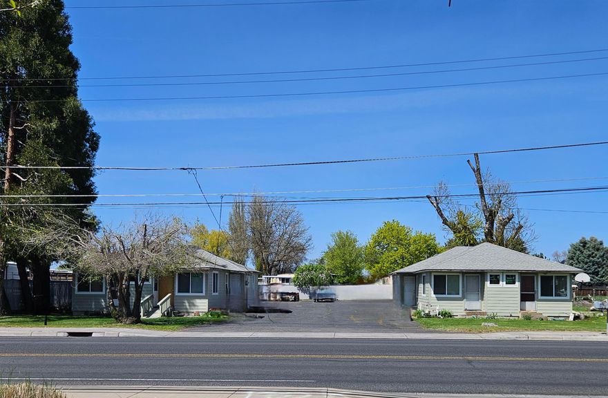 New Siding and freshly painted Multifamily income properties Located in an area close to schools and restaurants This property features two duplex units for a total of 4 doors! Each unit features a Living Room, Eat in Kitchen, Laundry Room, Original Built-ins that offer plenty of storage, updated bathroom and a nice sized bedroom. Plenty of parking space as well as 4 individual garages. Currently filled with Long term tenants.  This property has been well maintained and updated regularly. Newer Roof, New Siding, New Windows, New Exterior Paint. Each unit has private front and side entry.  This is a turnkey opportunity for the right investor!