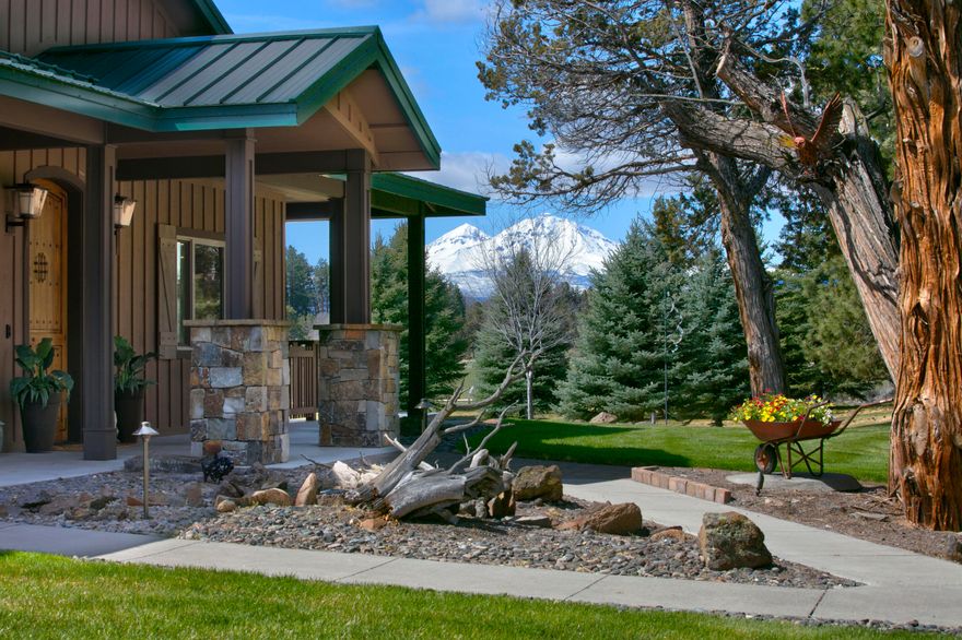 Seller accepting backup offers!

 Wake up to a glorious sunrise and commanding Cascade Mountain Views in Sisters, Oregon. Exceptional 30-acre estate has 7,014 SF of total living space and an irrigated hayfield with a pivot. Overlooking the pond from the outdoor living area with a fireplace and hot tub, the exquisite 5,120 SF main home has a great room, 3 beds, 3.5 baths, and many luxuries. The chef's kitchen has granite counters, high-end appliances & pot filler, a large island, and storage galore. Enjoy mountain views from the main level primary suite with fireplace and soaking tub. Downstairs is a bonus room, two bedrooms, a theatre plus concession area & wet bar. Zoned heating/cooling plus radiant floor heat in three full bathrooms. Treat overnight visitors to their own furnished 1,894 SF, 3 bed, 2 bath guest area. Ample covered parking, 2-bay garage, 3-door garage/shop, and 2 outdoor RV spaces with hookups. A fenced garden, orchard, and more in this extraordinary mountain retreat.