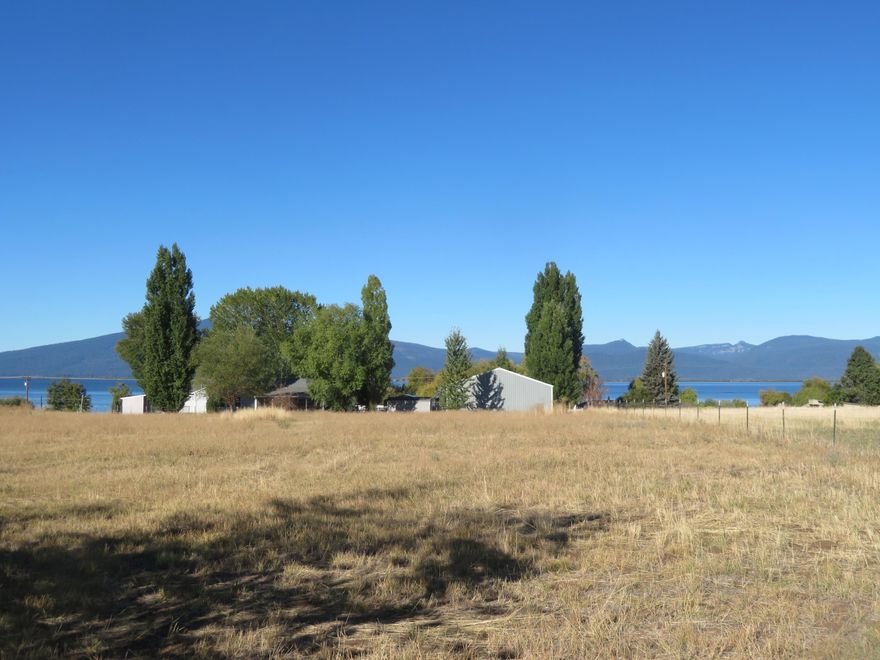 One acre view lot o Agency Lake Loop Road. Great views of Cascades, lake, sunset. Near Williamson and Wood River world class trout fishing. No HOA, No CCR. Build whatever your dream is! 2004 standard septic approval on file. Good access. Quiet street off Modoc Point Rd. Level lot near lovely Wood River Wetlands trail.  $26,000.