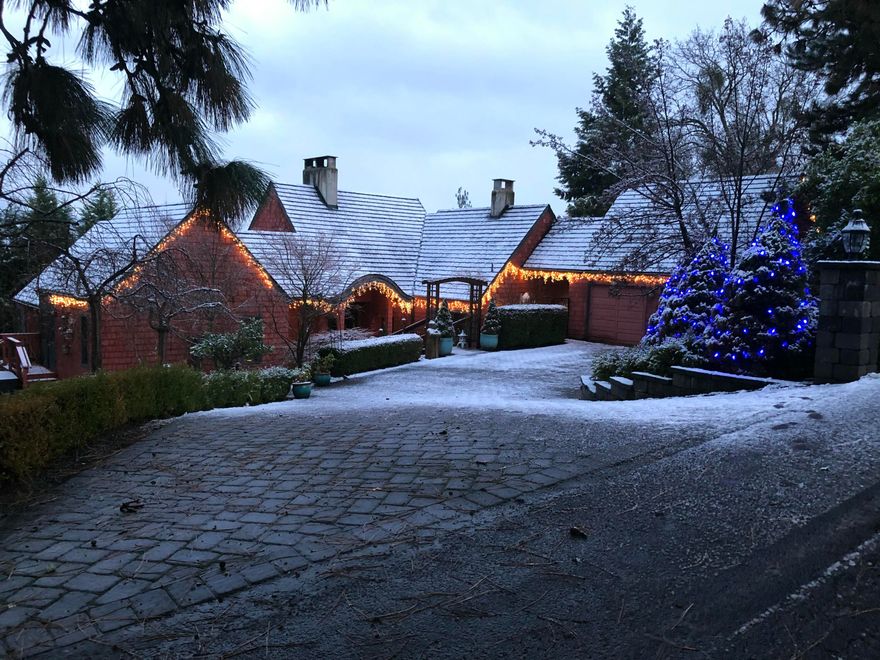 Situated in the lovely Stagecoach Hills neighborhood, this multi-level residence embodies limitless possibilities with its panoramic views of the mountains and valley. The property's interior shines with exquisite hardwood floors and a gourmet kitchen equipped with a high-end Wolf range, complemented by elegant tile and granite accents, alongside a spacious butler-style pantry. The primary suite, nestled on a private upper level, offers serene seclusion and features a stone fireplace, a sitting room area, and an updated bathroom with a large stone shower, heated tile floors, and dual sinks. The residence also features an in-ground pool / spa with expansive decking, perfect for creating unforgettable experiences. This multi- level design features French doors that leads to 3 additional bedrooms and guest bath