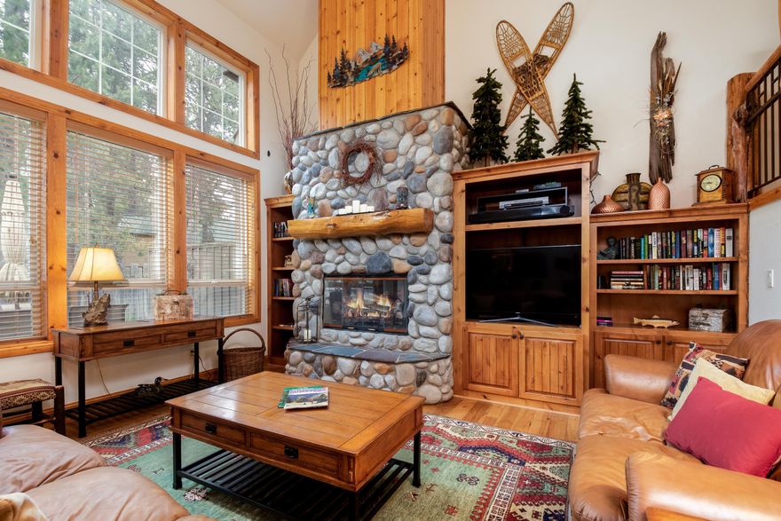 Meticulously maintained and stylishly appointed, this lodge style condo boasts a forested area beyond the outdoor living area. Desirable great room floor plan with the master suite on the main level and two additional generous sized guest bedrooms upstairs plus a loft area that can be a 4th sleeping area as well.  This GEM features two gas fireplaces, one in the great room and the other in the master suite. Recent upgrades include gorgeous newer hickory hardwood floors and carpet, insulation added so highly efficient, washer & dryer. Enjoy slab granite counter in the kitchen with an eating bar and stainless-steel appliances. Custom landscaping and paver patio. Outstanding HOA takes care of the outside entirely while you sit by the water feature and enjoy the wildlife that prevails in the Sunriver community. Abundance of storage in this home. SHARC paid. Hot tub,