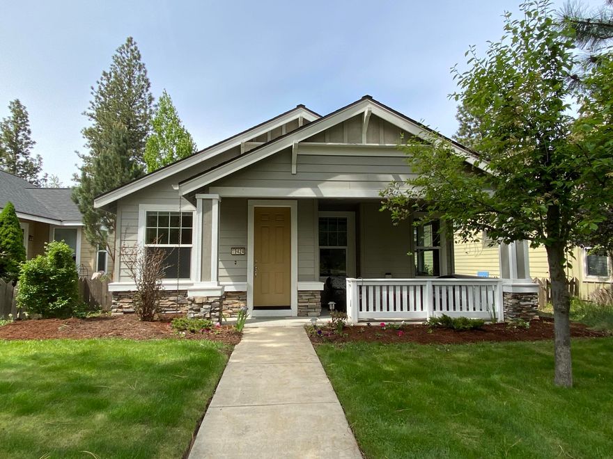 Parks at Broken Top is one of Bend's premier communities.  Located on the west side, it features a pool, sports court, lovely parks with picnic areas---along with easy access to walking trails, restaurants, OSU Cascade campus, and the Old Mill. This home's one level open floor plan includes a vaulted living/dining/kitchen great room and high ceilings throughout the house for a lofty, airy feel. Well-placed large windows and skylights provide lots of natural light.  The primary bedroom suite has a walk-in closet, bathroom with tiled shower and double sinks.  The den/office can easily be converted to a third bedroom.  Attached 2-car garage is located off the laundry room at rear of home and has lots of storage plus space for 2 cars in the driveway.  There is a large, covered porch and big side patio.  New roof '22; frig, water heater '23; furnace, AC, stove, dishwasher, microwave '20,  Excellent floorplan and use of space.  You will   appreciate the picturesque beauty of this community.