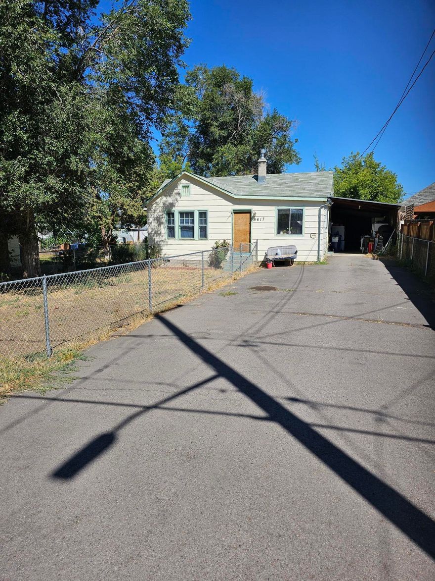 Bring your imagination. This can be a great rental, flip or owner-occupied home for someone looking to use sweat equity. Large carport and a possible 2nd living quarters.