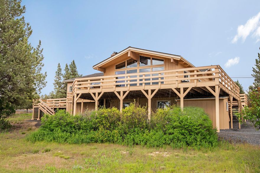 Hello Mountains! Are you looking for your own slice of Central Oregon paradise? This 10 acre property offers low maintenance natural landscaping, privacy, mountain and territorial views and is conveniently located near Eagle Crest. There is plenty of space for all of the toys and animals and currently features a chicken coop and apple and cherry trees. The main level includes the master and a great room large wood beams, vaulted ceilings, and  floor to ceiling windows overlooking the views. The large wrap around deck is perfect for bird watching and mountain gazing. The lower level offers a second bonus space with plenty of extra storage . With interest rates at an all time low why wait?