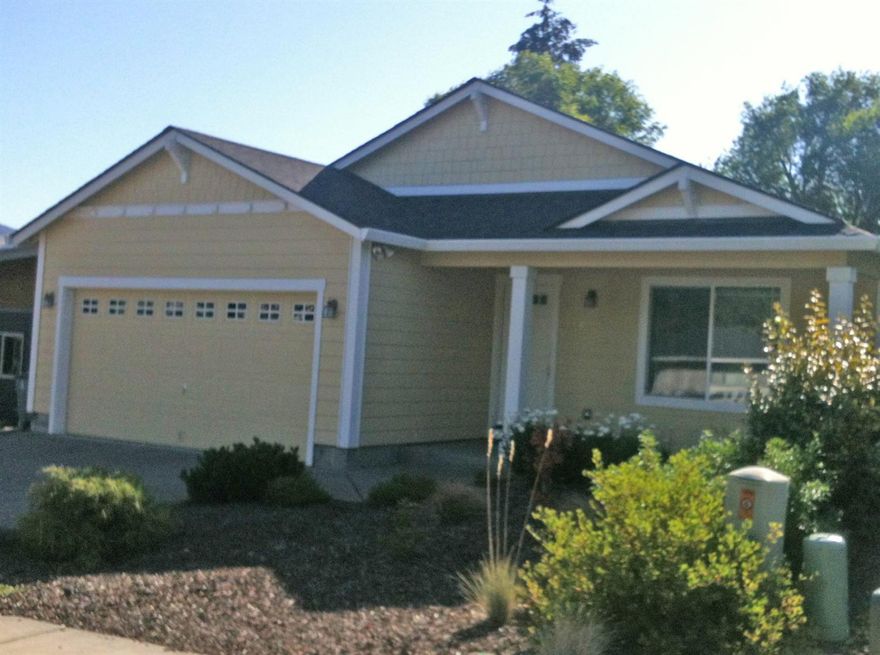 MOVE-IN READY, sweet single-level home just a few years young. Built by Adair Homes in 2012, it has a very open floor plan with a nice-sized, fully-fenced and usable backyard with easy-care landscaping and small area of raised beds. The two-car garage is finished and has a door to the inside laundry room. The master bedroom is accessed off the living room; the other two bedrooms are down a short hallway and are very close to the second bath and laundry room. Stainless appliances in the kitchen. This home is being professionally cleaned on July 6.