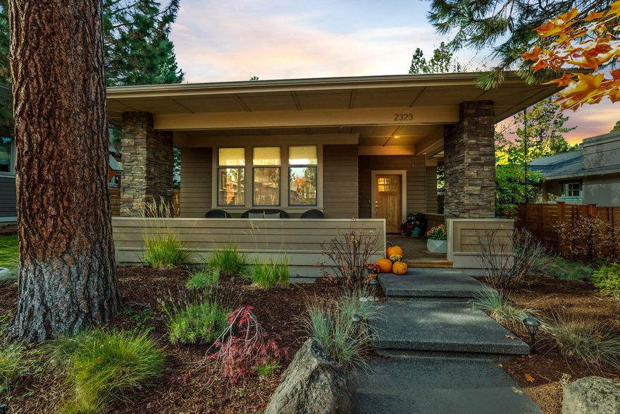 Live your most vital life in NWX! This neighborhood allows you to live, work, & play in the same community. Enjoy unprecedented access to Compass Park, The Grove Market Hall, High Lakes Elem, & more. Prairie-style architecture and front porch add instant curb appeal while high ceilings, upgraded hardwood floors, & new carpeting grace the interior. An open layout also adds a spacious dining area with a built-in sideboard & beverage refrigerator. The island kitchen provides a full array of stainless appliances, bar seating, & tons of counter space. Primary suite on the main level pampers with a soaking tub, separate shower, & walk-in closet. Secondary bedrooms are on the upper floor along with a spot for a computer station or your Peloton. Large paver patio plus hot tub, built-in grill, & outdoor fireplace await outdoor enjoyment. A separate, gated area finished in artificial turf makes an awesome pet or play space. Location & lifestyle converge here for the ultimate Bend life!