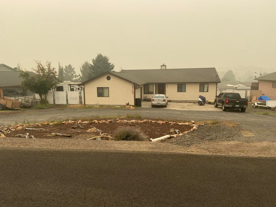 Views of the Cascade Mountains! This 1388sf home is located on a .46ac lot in Northridge Subdivision. 3bd, 2ba, home w/vaulted ceilings in the living area. Propane fireplace in living room. Living room and Master Bedroom has access to back deck through sliding door. All bedrooms located in one area of home.Nice size wood deck with mountain views for entertaining.