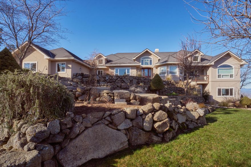 Stunning East Medford home with privacy and unparalleled views situated on 11 acres with adjoining BLM land. Conveniently located in Roxy Ann Heights, this property offers the space and privacy of rural living with convenient proximity to Medford. The 3988 sq ft home incorporates thoughtful and creative design elements with 3 beds/2 1/2 baths (additional bath space in basement), great room, open kitchen and other amenities and rooms that make this home truly unique. The home has a spacious 3 car attached garage and a daylight basement of over 2500 sq ft that could serve many purposes. The detached shop/garage has its own bathroom, 220 and is framed for a second level. Views of the valley and city below can be viewed from almost every room in the home and from the spacious deck that is perfect for entertaining guests. All of this with city water, natural gas, end-of-road privacy and gated paved access. The home is a 6 mile drive to either Rogue Regional or Providence Medical Centers.