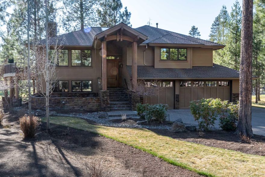 Situated on a private cul-de-sac, #6 Winners Circle has it all! Stunning golf course views to the 7th hole of the Woodlands golf course. Completely remodeled in a NW design where nothing was overlooked. High end finishes throughout - featuring hand scraped hardwood floors, granite & travertine countertops, S/S appliances, cherry cabinets, composite decking, paver patio, wired for sound, & there is even a indoor elevator shaft (currently storage).  All cabinetry features soft close hardware. Reversed living offers great views from the kitchen, dining and master bedroom. The master bath sports an exquisite tiled walk in shower as well as a jetted soaking tub. Also upstairs is a 4th bedroom/office & 1/2 bath. Two other bedrooms and a full bath are down along w/ a lovely family room w/ lots of cabinets & a river rock framed gas fireplace. You will find a large mudroom on the way to the 3 car garage. In the garage there is a golf cart storage room that would make for a great shop.