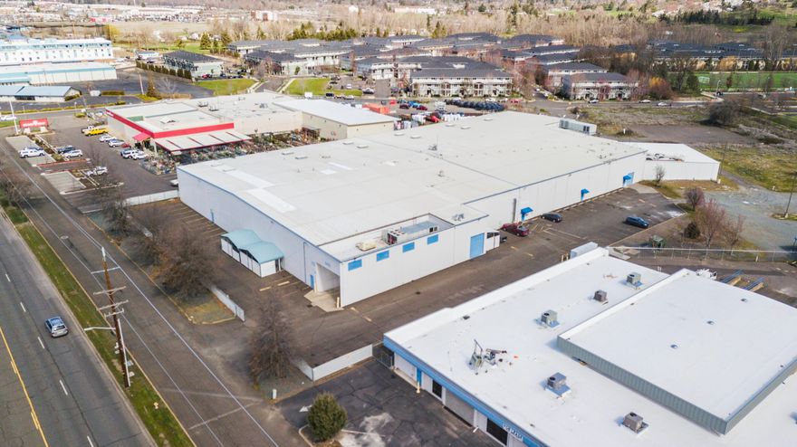 71,325 SF Class ''A'' Manufacturing Facility In The Heart Of Medford.  This facility sits on 6.19 Acres of GC zoned land and has easy access to I5 and South Pacific Hwy.  The building is concrete tilt up construction, climate controlled, served by an enormous 480 3 phase electrical system, and has 8 dock high loading doors.  Other amenities include epoxy floors, high ceilings, incredible insulation, office space, asphalt parking and staging/ storage areas, covered docks, 6''+ thick concrete floors, large heating and cooling systems, energy efficient motion controlled lighting, security systems, Hunter Communications Internet, etc.

Notice:  No warranty or representation, express or implied, is made as to the accuracy of the information contained herein; all information contained herein is subject to change, errors, and you're independent verification.