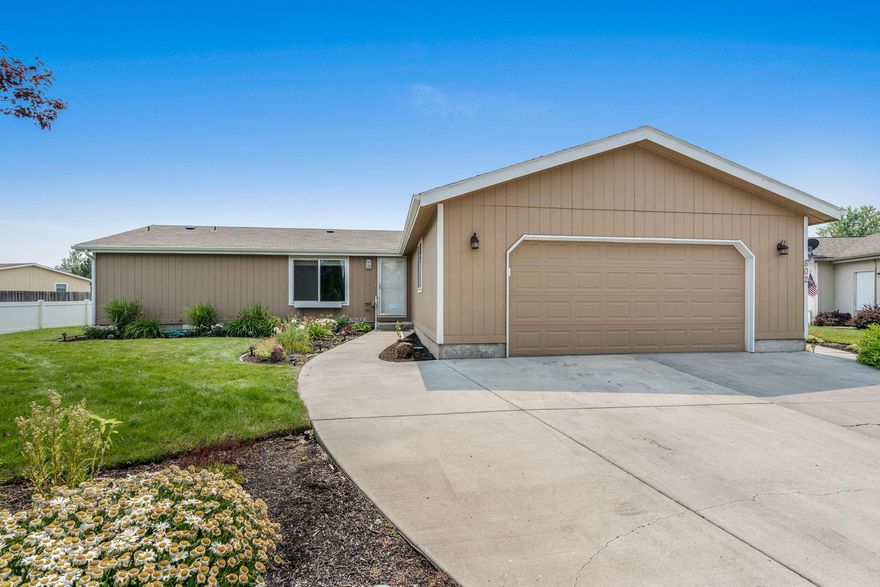 Don't miss this thoughtfully updated single level home on a quiet cul-de-sac in NE Redmond! 2005 Fuqua triple wide manufactured home w/tons of accessible open living space, updated carpet & paint. 2,175 SF w/three generous sized bedrooms & two full baths. Kitchen ftrs a large island w/solid surface counters, breakfast bar, tons of cabinetry for storage, walk-in pantry, & updated stainless steel appliances included. Primary bedroom features an additional flex space or sitting room, large walk in closet featuring built-ins, primary bath w/large soaking tub, his/hers sink areas, & walk-in shower. Two additional bedrooms share a large full bath w/shower & tub combo. One room could also serve as an office space or flex room! Laundry room boasts sink & washer + dryer. Covered back deck for year round entertaining, concrete pathway that leads back around to the front, full landscaping front/back w/sprinklers, fenced in back/side yards, & shed stays! Minutes to downtown, restaurants, & more!