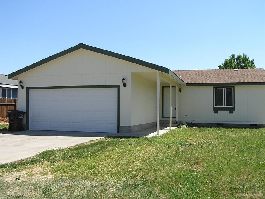 1248 SF Fuqua Manufactured home with attached 2 car garage, fenced yard. New exterior paint. New carpet, vinyl. New windows to be installed by COE. Hand driven irrigation well in back yard, no pump.