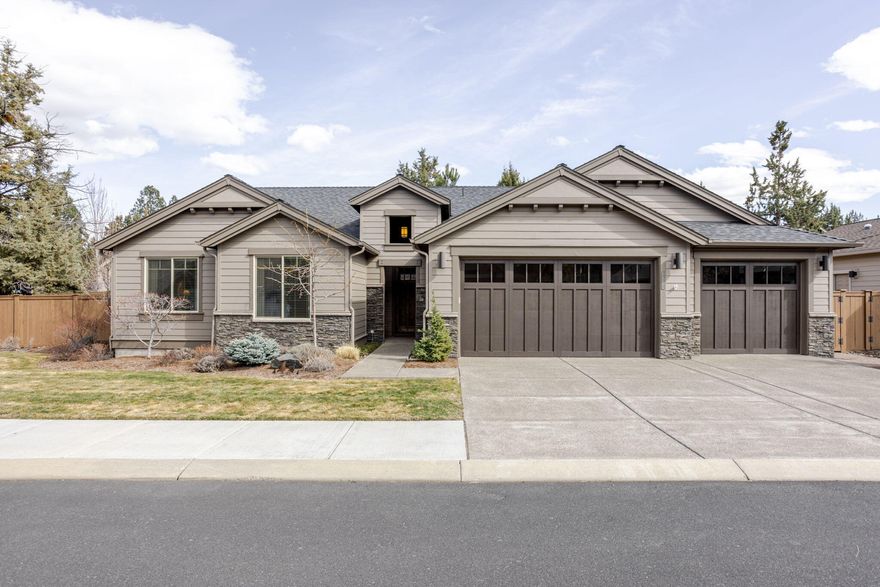 Single level home in the gated community at Rivers Edge Village located across the street from the beloved River Trail. 2002SF / 3 bedrooms / 2.5 bathrooms / .21 corner acre lot / built in 2014. Nice bedroom separation with large Primary suite. Great room with expansive windows, vaulted ceilings & stone gas fireplace with built-ins. Open kitchen with quartz counter tops, engineered hardwood floors & SS appliances. Walking out from the dining room onto a large, covered patio with a water feature & beautifully landscaped yard & gardeners shed. The 3-car garage with ample attic storage completes this wonderful home!