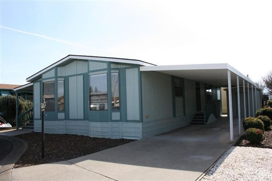 This is a nice home in a quiet 55+ Mobile Home Park. It has a new roof, new deck carpet, new exterior paint, new interior paint, new carpet, and new vinyl flooring. Very low maintenance yard. Looks & smells like brand new. All information is deemed accurate but not guaranteed. Information may be subject to changes.