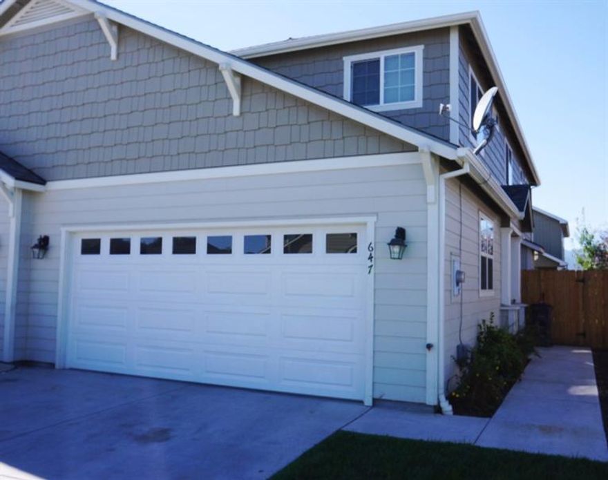 Super nice home with a modern feel inside! The 3 bedroom 2 1/2 bath home built in 2011 boasts 1774 Sqft! This home comes with all appliances including the fridge and washer/dryer - Truly turn key and ready to move-in! Granite counter-tops - stainless steel appliances - gas fireplace - large bedroom - 2 car finished garage with fenced yard and sprinkler system. Priced to sell! A must see!