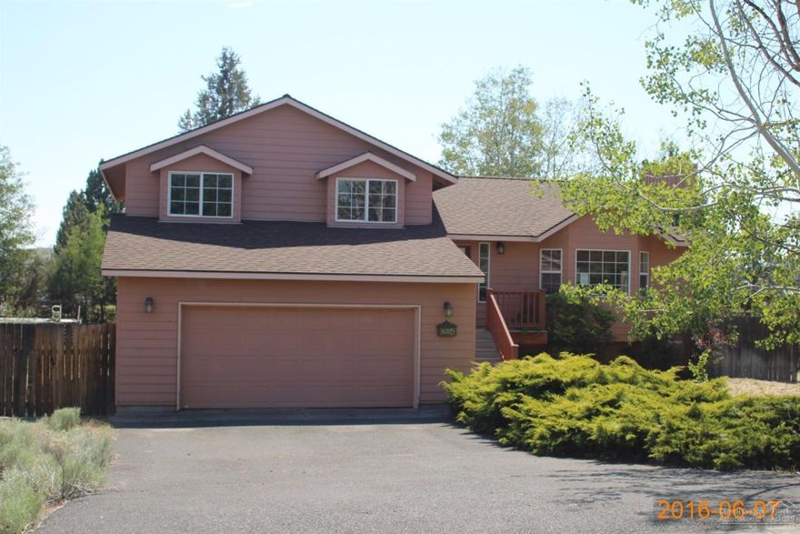 Large Fenced yard over 1/2 acre room for all your toys.Two large decks for entertaining close to shopping and easy access to the patrkway.