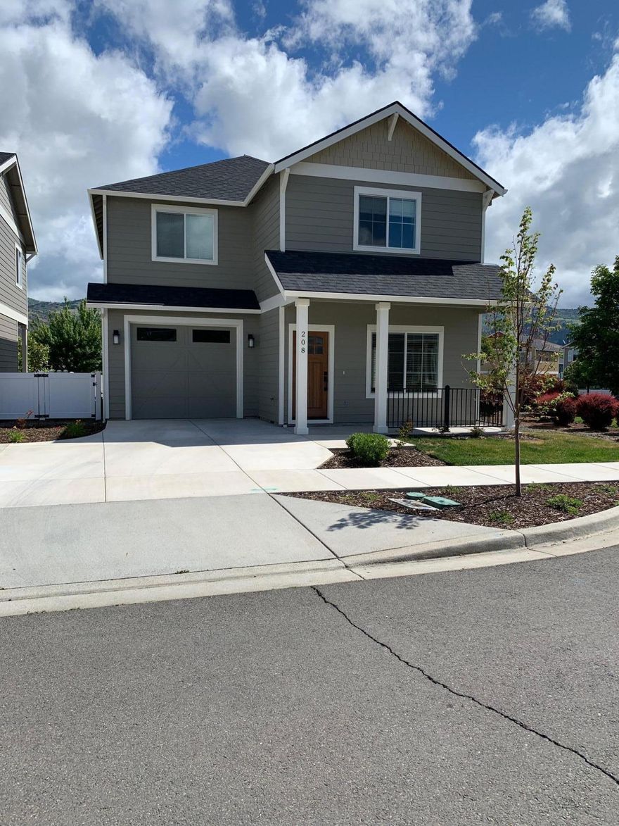 This light filled home is warm and spacious with many thoughtful details and intimate nooks to relax in. Gorgeous Walnut hardwood floors are reclaimed wood from over mature orchards in California. French doors afford a view of Roxy Ann. The upstairs office looks out to grizzly Peak and the upstairs bedrooms look out on Wagner Butte and Siskiyou mountains. The Talent location is minutes to downtown Ashland and Medford with a bike path just blocks away. The upstairs features a comfortable office/crafts area with built-in bookshelves and a very cozy and comfortable window seat. The master bedroom is spacious with a walk-in closet and generous soaking tub. Built in 2019, this home is worry free with new appliances and fixtures.