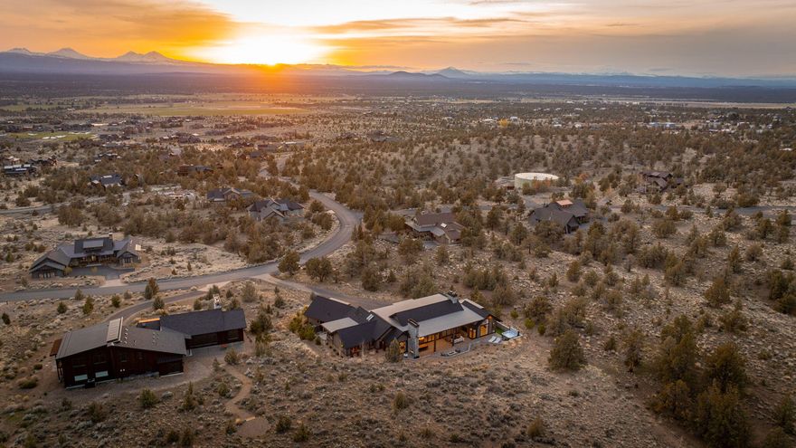 Introducing a One-of-a-Kind Custom Home by Sun Forest in Brasada Ranch. Nestled in the heart of the high desert with sweeping views and unmatched craftsmanship, this newly built masterpiece redefines luxury living. Every inch of this custom home is meticulously designed with top finishes, innovative technology, and inspired design elements perfectly blending modern sophistication with Central Oregon's rustic charm. From the chef's dream kitchen featuring a massive quartz island, 8-burner WOLF range, and Sub-Zero wine fridge, to the soaring 25' ceilings and indoor-outdoor living spaces anchored by a custom Earthcore Isokern fireplace—this home is built to entertain and impress. Retreat to the lavish master suite, where a curated mix of textures, light, and warmth welcomes you with a spa-like bathroom with heated floors, and a stunning walk-in closet by California Closets. So much more to see.