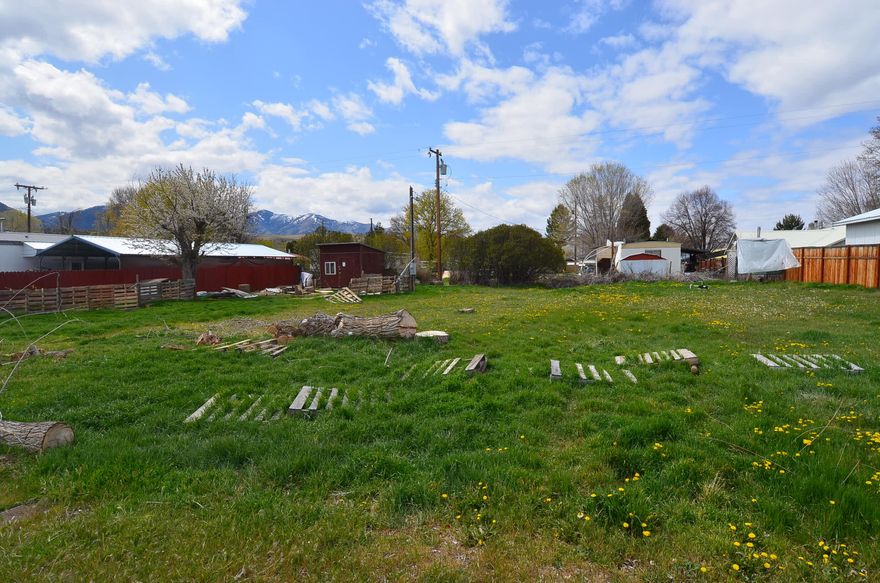 Catch this opportunity quickly! .26 acre lot in Mount Vernon with power, city water and city sewer connected. This lot is flat and ready for your custom home or new manufactured home. There is a storage shed and shallow irrigation well for watering your lawn. Call today to inquire!