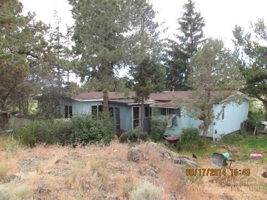 Short sale, property has some deferred maintenance needed. Older home on small acreage, with easy access to all of Redmond.