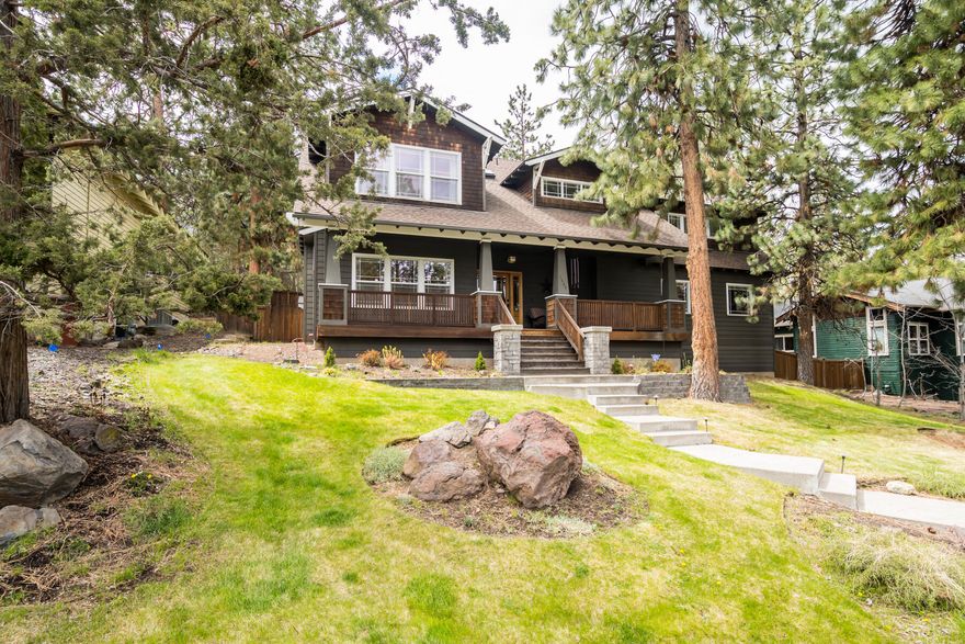 Located in the coveted Miller Heights neighborhood in NW Bend you will find this beautifully updated home on a large lot. As you enter, you will love the refinished hardwood floors throughout the main level. There is a formal living room with a gas fireplace, custom built-ins, and a spacious formal dining area for entertaining guests. The kitchen is bright and open with newer stainless appliances, solid surface counters, island/breakfast bar and secondary dining area off the kitchen. Upstairs you will find the primary suite complete with walk-in closet, double vanity, tile shower and soaking tub. There are 2 more guest bedrooms, a large bonus room/office, plus there is plenty of storage throughout! Enjoy relaxing this summer on the paver patio in the backyard or on the covered front porch! Additional features include natural gas forced air, AC, attic for storage & an oversized garage. Prime westside location around the corner from Overturf Park & just a few blocks from Downtown!