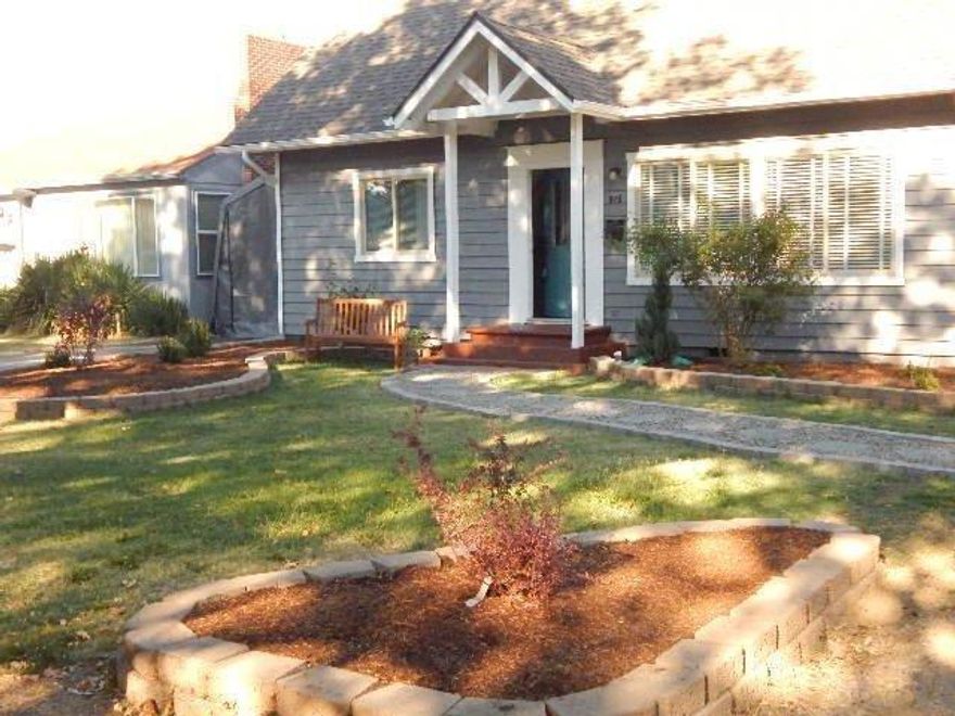 1940's cottage located on Whitman which is almost a dead end street, Quiet with little traffic, close to schools, golf course, water park, tennis courts and shopping minutes away. Cute as can be with 4 bedrooms and 2 baths. Fresh designer colors, plantation blinds, fireplace with efficient and clean electric insert for extra coziness. Huge master with vaulted ceilings and plenty of closet space, new carpet, new fixtures, 2 bedrooms up and 2 down. All new stainless appliances and new bathrooms complete this wonderful package that you can call home. Sprinklers and drip, Garden beds with pumpkins included.