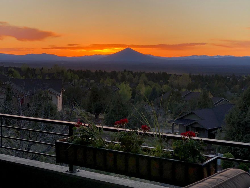 This ''Like New'' custom built Powell Builders home doesn't disappoint. Attention to detail will be seen throughout. This open floor plan features Knotty Hickory stain & glazed cabinets. Wire brushed engineered oak floors, real stone work. Perfectly placed large windows in the great room to see the mountains while taking advantage of the natural light. High ceilings. Granite counters, huge island in the kitchen along with the famous ''Hidden Pantry''. Tons of storage and stainless appliances. Huge utility room with lots of storage. Built-ins throughout. LED lighting found in the entire home. Oversized 2 car garage & half garage/shop on the lower level. Spending time outside you will enjoy all of the fun places to entertain while enjoying the views sitting in front of the outdoor fireplace off the main living area or the firepit on the lower level. Beautifully landscaped. Solar system installed allows you to sell back your excess to electric company. This home is turn-key and beautiful.