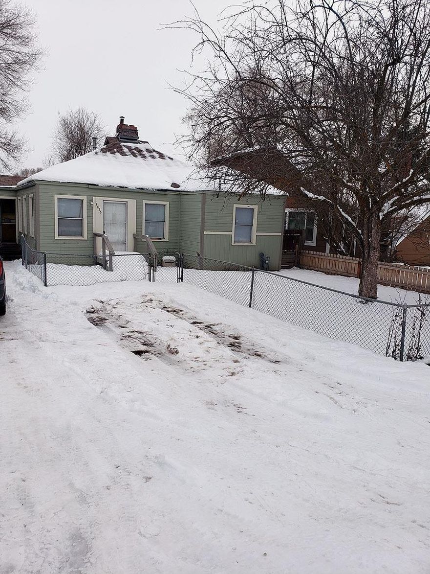 This property offers a large covered back deck, great for entertaining, a big back yard with alley access for RV/Boat parking. Front yard and back yard are fully fenced. Two bedrooms and an extra finished bonus room with closet. Well-kept and priced just right.