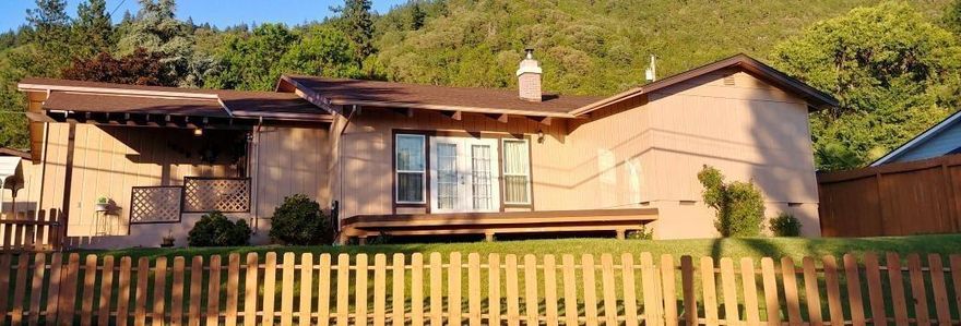 Priced to sell! Amazing views overlooking the city in desirable NE neighborhood. This 1747 SqFt, 3 Bedroom, 2 bath home features an oversized family room with a beautiful custom stove insert, vaulted wood beam ceiling designed for entertaining. French doors lead to deck and views of the valley perfect for relaxing. Large bonus room for an office/craft room or living space. Private fully fenced backyard with 2 sheds provide plenty of storage. All this conveniently located minutes from town.