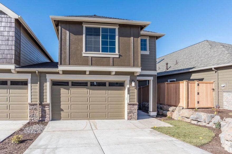 FOR COMP. Experience a smart floor plan, with exceptional interior appointments, in one of Central Oregon's premier communities. Featuring stainless steel appliances, laminate wood flooring, solid surface quartz counters with an under-mount stainless steel sink, and a custom backsplash in the kitchen. The open great room lives large, and centers on a beautiful stone fireplace. The spacious master features a walk in closet and dual sinks in the bathroom. You will also enjoy a built in desk area for working from home, and an upstairs loft/bonus room. The backyard has a spacious deck as well as custom paver patio below with water feature and low maintenance landscaping. Located in a community that has well-kept parks and is very close to Ten Barrel Brewing, Pine Nursery Park, Bend Indoor Sports, Ponderosa School, and within minutes to the Bend Parkway.