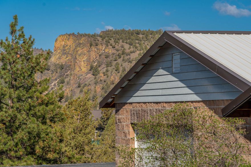 Unique Offering in Ochoco West with access to an abundance of recreational! You will love the spectacular views of rocky outcroppings and mountainous terrain from this one bedroom, on bath, 762 Sq Ft home built in 2006 on over half acre. Comfortable living room w/wood floors, ductless heating/ac, storage/pantry area, lots of natural light from wood cased windows and slider to large open Trex deck, new in 2021. Kitchen/dining area features tele flooring, under counter lighting with all appliances included. Spacious master bedroom has walk in closest, ductless heating/ac unit & ceiling fan. Large RV garage with 14'door, workshop area & additional storage room. Easy access includes circular drive for RVs with complete hookup plus new 2 bay carport. No Maintenance for nicely fenced natural yard w/drip system for flower beds. Community offers miles of ATV &  hiking trails, access to BLM, fishing pond, pool, horse stables, shooting range, & more. Just minutes NW of Prineville!