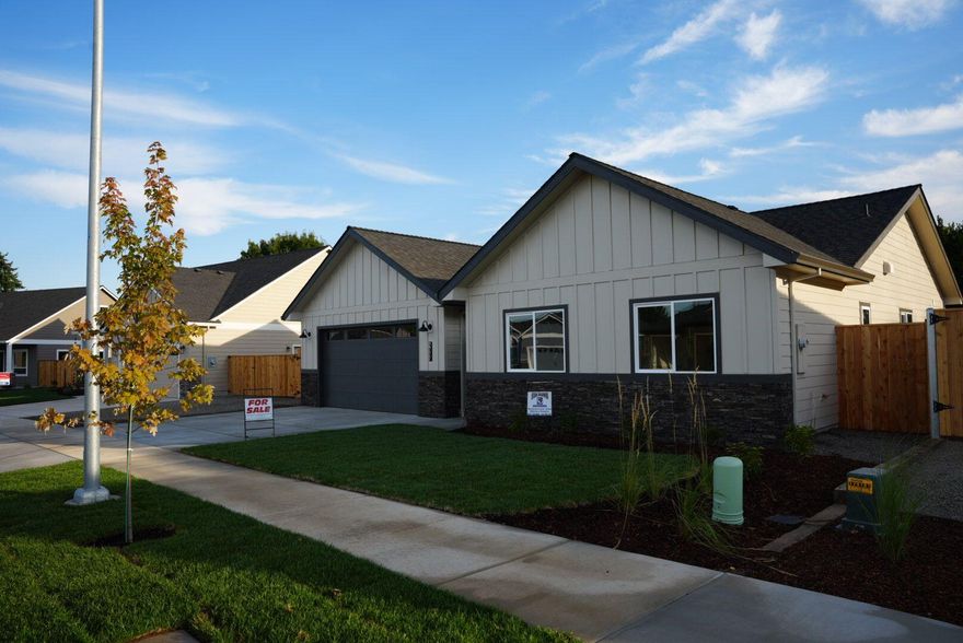 Discover your perfect home in this brand-new single-family residence, thoughtfully designed with modern finishes and spacious living areas. Located in a desirable neighborhood, this home offers convenience, comfort, and style.

Open split floor plan with plenty of natural light and vaulted ceilings
Modern kitchen with custom cabinets, ample storage and Samsung applicances, including refrigerator

Vaulted ceiling in master suite with ceiling fan 

Double sinks and separate lavatory in master bath

Leathered granite countertops, tile floors, upgraded laminate and carpet throughout
Beautiful electric fireplace with rustic mantel
Private backyard, perfect for relaxing or entertaining
Attached insulated 2 car garage and additional sideyard parking

Professional landscaping front and rear, including fully fenced yard

Hardie lap siding with enclosed soffits and milgard windows
Close to schools, shopping, dining, and medical care