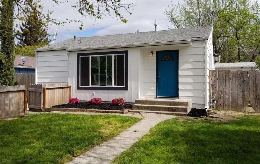 This charmer will impress you with its contemporary upgrades. Boasting features such as quartz counter tops, recess lighting, continuous luxury VP flooring, tile back-splash, and brand new central heating-A/C unit and appliances... Every room will leave you wowed! The large yard provides a private feel and tons of room for outdoor entertaining. Fully fenced frond and back yards with gated entry from the alley access leaves room for parking your toys as well. Tour it today, at this price it won't last long! Recent home inspection and appraisal available. (Listing real estate broker has ownership interest in home)