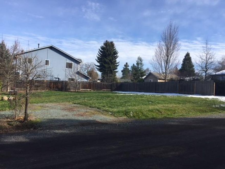 Level and usable residential building lot in a great location near the University, Shop N Kart, YMCA and Bellview elementary. It has been in the family for a number of years and is a great Ashland opportunity. A neighoring driveway borders the South end of this lot so it feels even more spacious than it is. Bring your builder and have your custom home in a prime location surrounded by other well maintained properties.