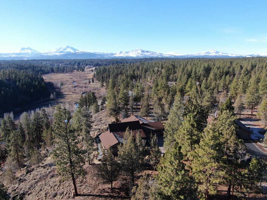 This home was thoughtfully, intentionally renovated and professionally landscaped, focused on the magnificent Cascade Mountain Views! This single level home provides abundant natural light and mountain views throughout the home. Separation between the Master Suite and the additional two ensuite bedrooms provides privacy and a spacious feel. The open concept main living space includes a large dining area, comfortable breakfast area, updated kitchen with premium appliances and an expansive living area that fully captures the canyon, Whychus Creek and Cascade Mountain Views! The outdoor living space provides many different options with two plumbed propane fire pits, a built in BBQ, expansive seating area and a built in hot tub! The RV barn includes guest quarters with full bath, washer and dryer an RV area currently utilized as a game room, and a separate garage bay that can accommodate multiple vehicles. Truly a turn key property in every sense of the word!