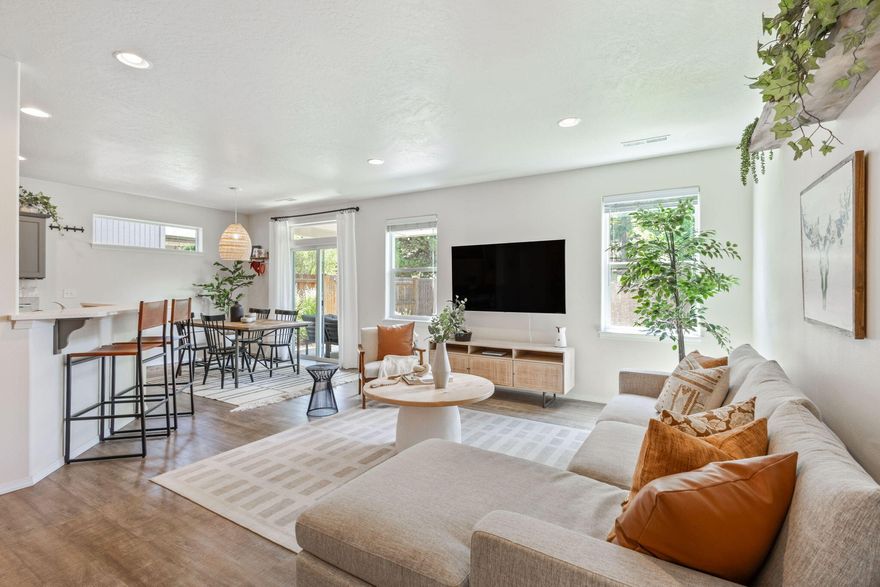 Welcome to this beautifully maintained single-level home that perfectly combines comfort, style and convenience. Flooded with natural light, the open floorplan creates a seamless flow between the spacious living room, dining area and kitchen - ideal for both everyday living and entertaining. Featuring 3 bedrooms and 2 full bathrooms, this home offers plenty of space for family, guests, or a home office. The large primary suite has ample closet space and a private ensuite bath. Enjoy morning coffee or a quiet evening on the cute front porch and unwind under the covered patio in the private backyard - perfect for gardening, play or outdoor dining. Located just moments from Eagle Park, local shopping and popular restaurants, this home offers both tranquility and easy access to everything you need.