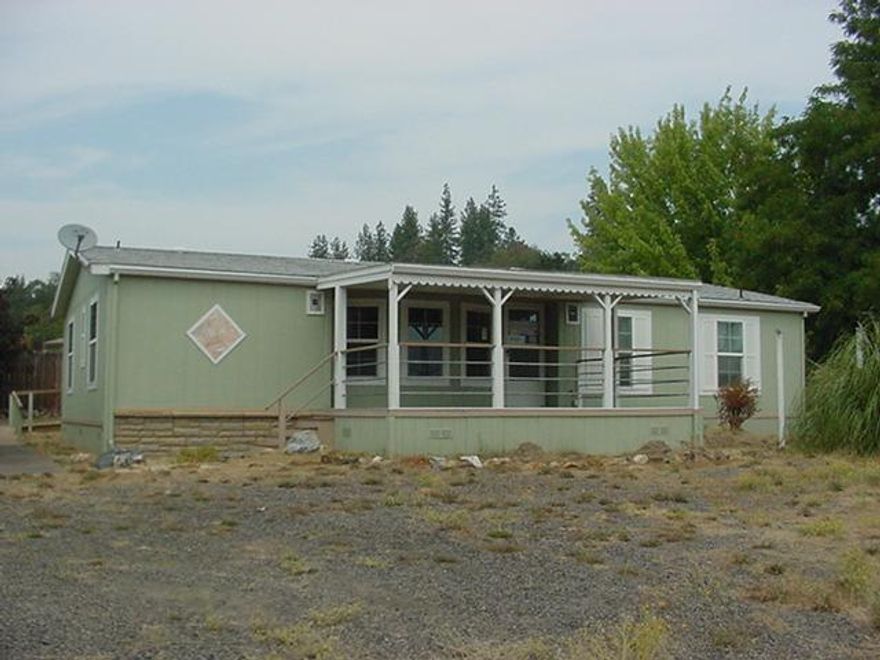 This is a Fannie Mae Homepath property. Lovely country feel but not far from town. Has spacious living area, cute kitchen with good cabinet space. Family area has lots of natural lighting. Nice master bed & bath. Garage has been converted into additional unit. Nice tile in the kitchen, has a full bath and 2 more rooms. Garage still has 2 parking spots. This is a must tour!!!