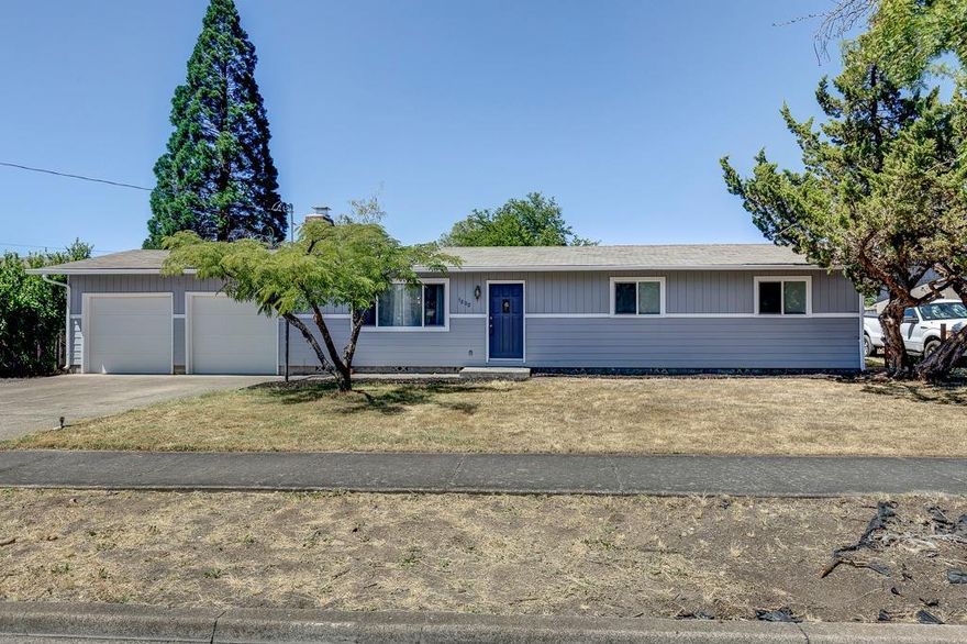 Here is your opportunity to purchase a beautifully remodeled E. Medford home. Renovations here were extensive. The kitchen is gorgeous and boast of new cabinets, beautiful quartz countertops with undermount sink, extensive tile backsplash, new stainless steel appliances including a gas range and refrigerator, recessed lighting, beautiful laminate floors and an open design to showcase the fireplace in the great room. Both bathrooms are sure to impress too with both featuring tile floors, new cabinets, marble counter tops and dual vanity. Other improvements are included but are not limited to: New forced air high efficiency gas furnace and AC, new ducting, new hot water heater, new 200 amp electrical panel, new windows and sliding door, new garage doors, and so much more. This property also features a large .22 acre lot. Home warranty included. Hurry, this will not last long.