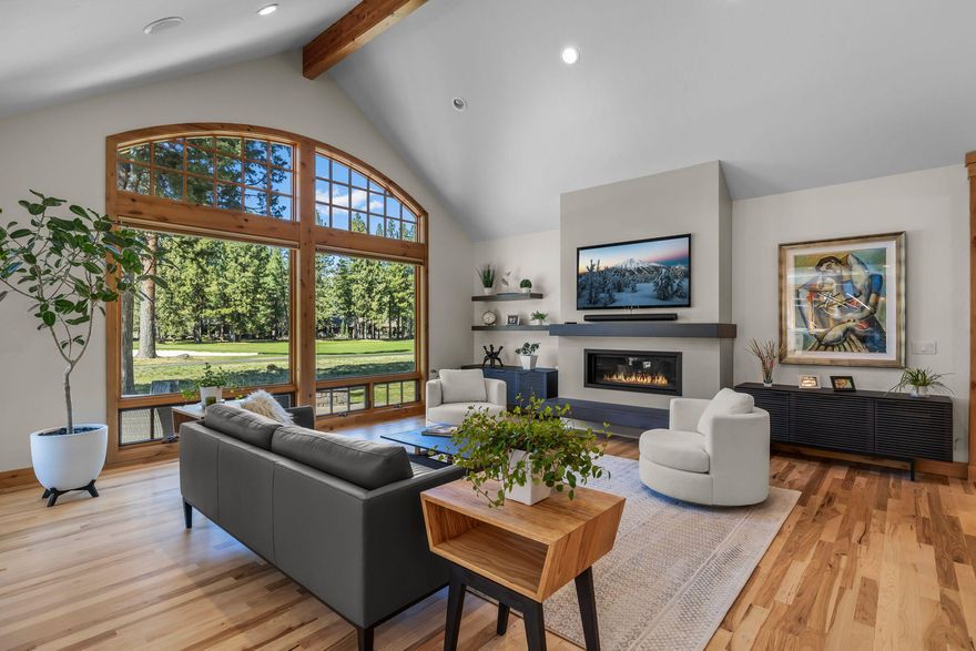 Broken Top Golf Course view home provides single level living with primary suite, 2nd primary and office all on main level. Meticulously updated, blending contemporary sophistication w/mountain lodge architecture to create a cheerful & warm ambience. Upon entering vaulted great room, the views are on full display thru floor to ceiling windows & continue to dining area, complete w/ cocktail bar & serving buffet and on to sparkling remodeled kitchen. Luxurious golf course view primary suite, w/remodeled bath is located in private wing of main level, along w/ centrally located courtyard view office and a 2nd primary suite located in separate wing, offering a private retreat for guests. Upper level reveals an addtnl guest bedroom, bath, & oversized bonus room w/closet, providing flexibility to serve as a 4th bedroom. Outdoors, a paver patio spans the back of home, creating the perfect setting for entertaining w/built-in grill & cozy firepit, all set along the stunning golf course backdrop