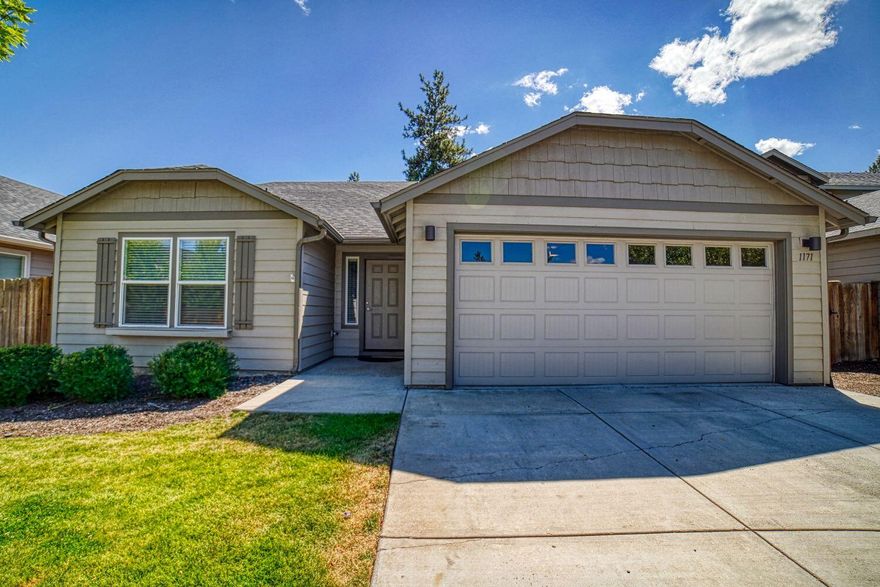 Discover the comfort of this charming single-level home in the desirable Village at Cold Springs community of Sisters. Featuring three bedrooms and two bathrooms, this residence includes modern stainless steel appliances and a cozy propane fireplace for winter evenings. Stay cool in the summer with efficient air conditioning and enjoy abundant natural light throughout. The landscaped front yard enhances curb appeal, while the low-maintenance, very large fenced backyard offers a peaceful retreat for pets and gatherings. Just minutes from downtown Sisters and all three schools in the Sisters School District, this community also features a lovely park and scenic paths, making it an ideal place to call home. Seller will credit $15,000 toward Buyers closing costs/rate buydown at closing.