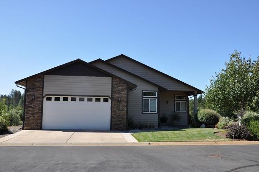 Located in 55+ community with security gate, club house with meeting room, exercise room, full kitchen, swimming pool, hot tub, tennis courts and RV storage. Close by you'll find the Illinois Valley Golf Course. This home features many upgrades such as tiled showers and granite countertops. 3 bedrooms and 2 bath with inside utility. Outside enjoy views of the surrounding mountains from your deck.