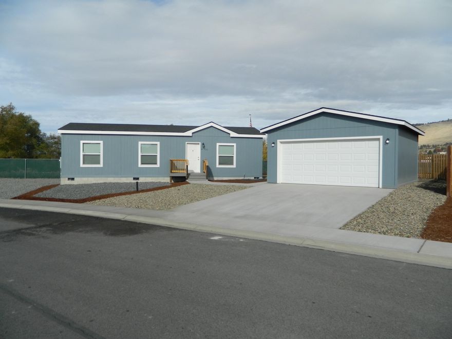 Brand new home on land with a 2 car garage move in ready. If you are looking for a great starter home, here it is. This 2 bed 2 bath home has a primary bedroom set up
with a bath and walk in closet. It is located in a subdivision full of new homes. It has updated LVP flooring throughout