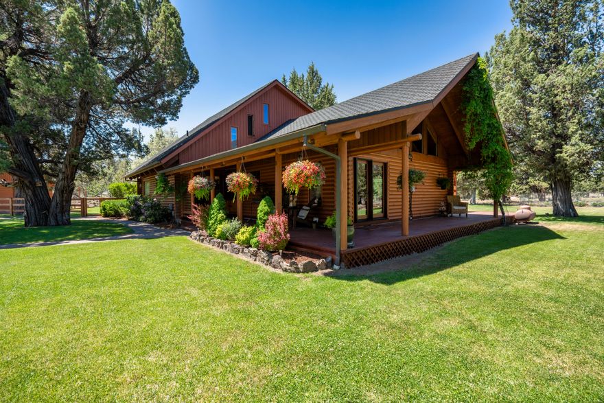 Welcome to this stunning log cabin, offering over 2,000 sq ft of living space on more than 2 acres along with beautifully landscaped grounds. This home seamlessly blends rustic charm with modern amenities, featuring new appliances, custom-made hardwood floors, and expansive windows. With 3 bedrooms, 3 baths, and high ceilings, the interior is spacious and inviting. Multiple entertaining areas, including a family entertaining room and numerous balconies, provide the perfect setting for gatherings.
Step outside to enjoy finished landscaping, a soothing water feature, and a luxurious jacuzzi tub. The property is fenced for privacy and boasts an oversized 3-car garage with ample storage, RV parking with 50 amps service and RV dump and a circular driveway for easy access. Located on a corner lot, this home offers both seclusion and convenience. Whether you're hosting guests or seeking a peaceful retreat, this cabin has it all. Don't miss your chance to own this exceptional property!