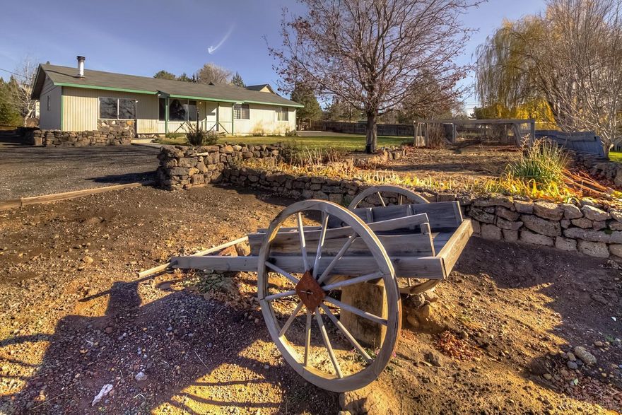 Almost 1/2 acre lot in town with amazing Cascade Mountain Views! Situated on the NW side of the hill, here you'll enjoy the large gardens, summer sunsets, wildlife & plenty of RV/Toy Parking. Single owner, Single level, family style 3 bedroom home that's looking for new owners. Triple detached garage & shop w/ 500+ sq ft bonus room above w/ private access w/ potential for more! All appliances stay with the house - Turn key.