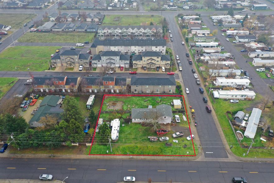 Investors! This corner lot is .45 acres and it is zoned WCUR-30. Surrounded by four-plexes and multi family. Great location on Avenue C. Value is in the land