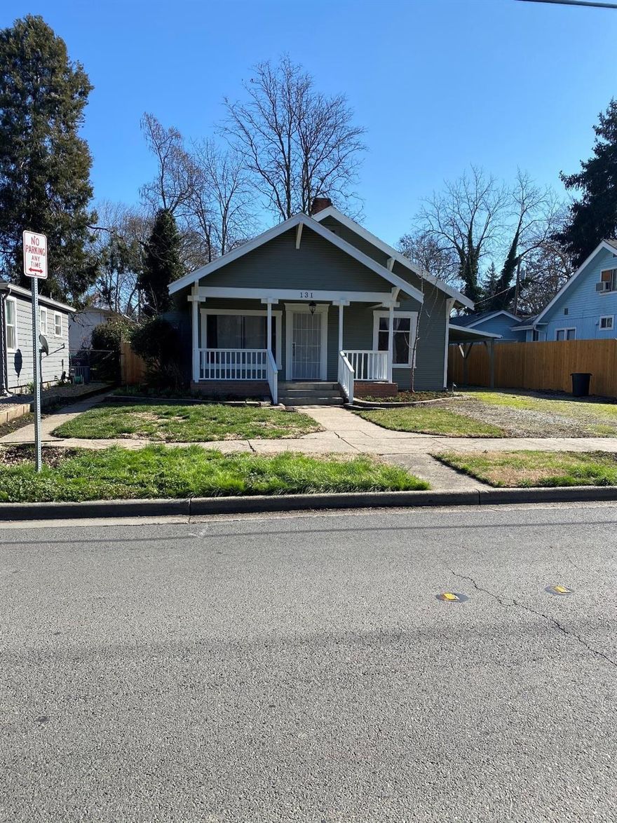 This vintage cottage style home is a dandy! The cute front porch welcomes you to this freshly painted home. The living area has what looks like the original hardwood floors, a picture window & a wood burning fireplace. The kitchen has an amazing quantity of cabinetry & counter space & all appliances stay. There is a dining nook with windows looking out over the backyard. The two bedrooms have double closets for plenty of storage. Another room could be used as a bedroom but it has no closet. It is perfect for an office, play or craft room. There is a slider off this room leading to the side yard that allows a separate entrance for a home office. The bath has a new tile floor and toilet. The good sized utility room leads out to the patio & back yard where there are two nice storage sheds. The HVAC unit is only 2 years old. The front yard is just about to be in full bloom of spring flowers! This sweet home is perfect for the first time home buyer, small family or investment rental.