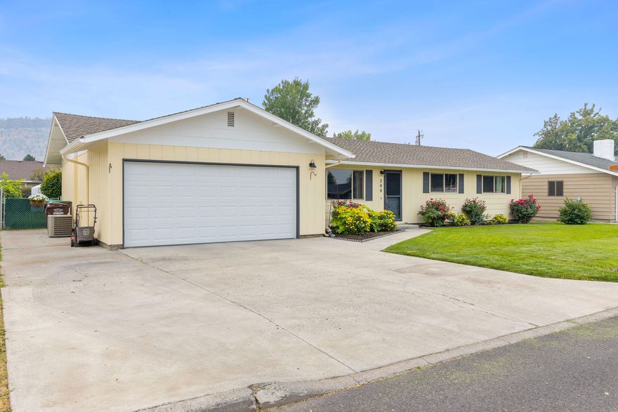 Absolutely beautiful! Located on a quiet cul-de-sac, this updated home has features that are usually found in a lot higher priced homes. 4 bedrooms, 2.5 baths. Dining area, large spacious kitchen with Corian countertops, laundry room, attached garage and much more. Flooring has been replaced through almost all of the home. Lots of room to expand for a great price. This home has been meticulously cared for. Walk through the sliding door to the patio of your dreams.  The perfect spot to relax on those hot summer evenings. Amazing landscaping with beautiful mature trees, shrubbery, and flowers. And have you seen the ROSES?! Irrigation well makes it easy to keep the yard beautiful and green. Green house not included. Rare, large lot that is hard to find. Priced to sell!